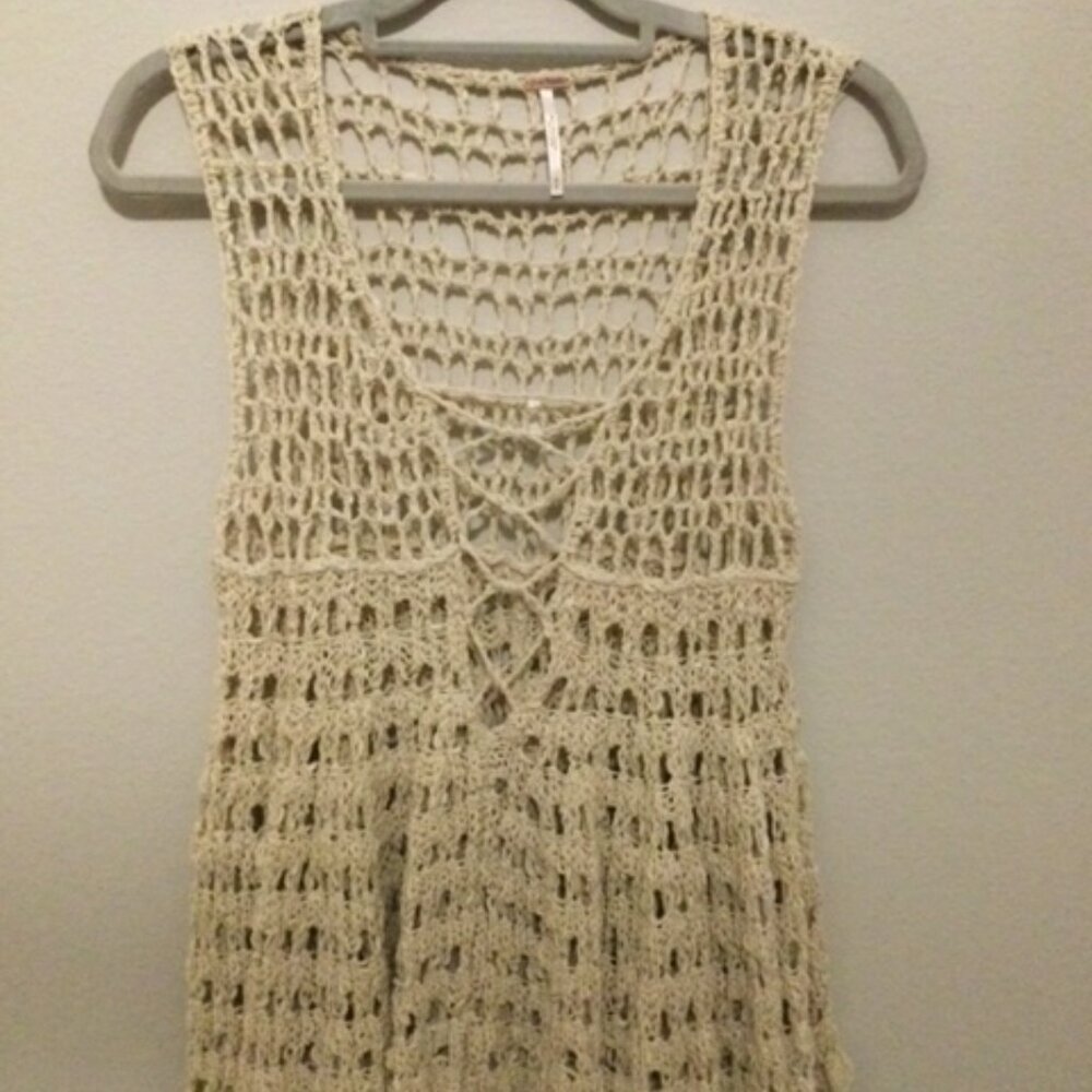 Ivory/tan crocheted Free People top. Sleeveless, Small